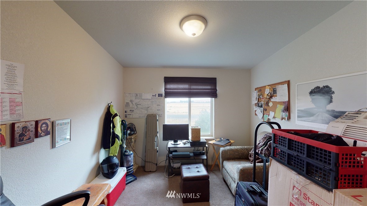 196 Skyrocket Road Prescott, WA 99348 - Photo 18 of 21 a bedroom with furniture and a window