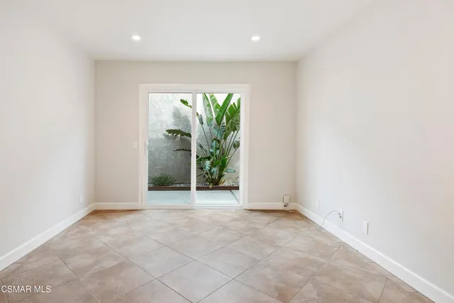 a plant is in front of a house