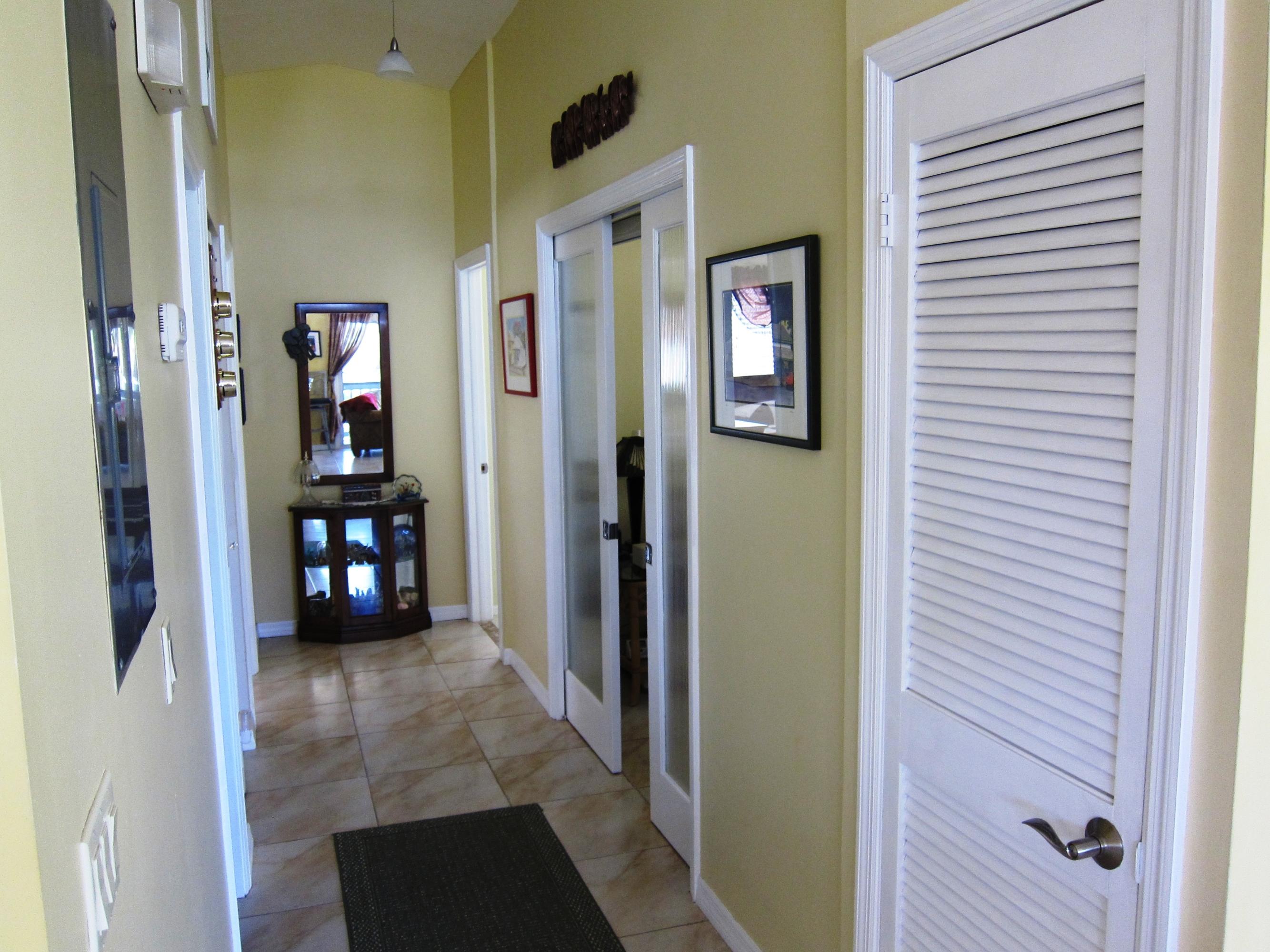 29527 Ranger Avenue Big Pine Key, FL 33043 - Photo 22 of 27 Wide Hallway leads to Bedrooms