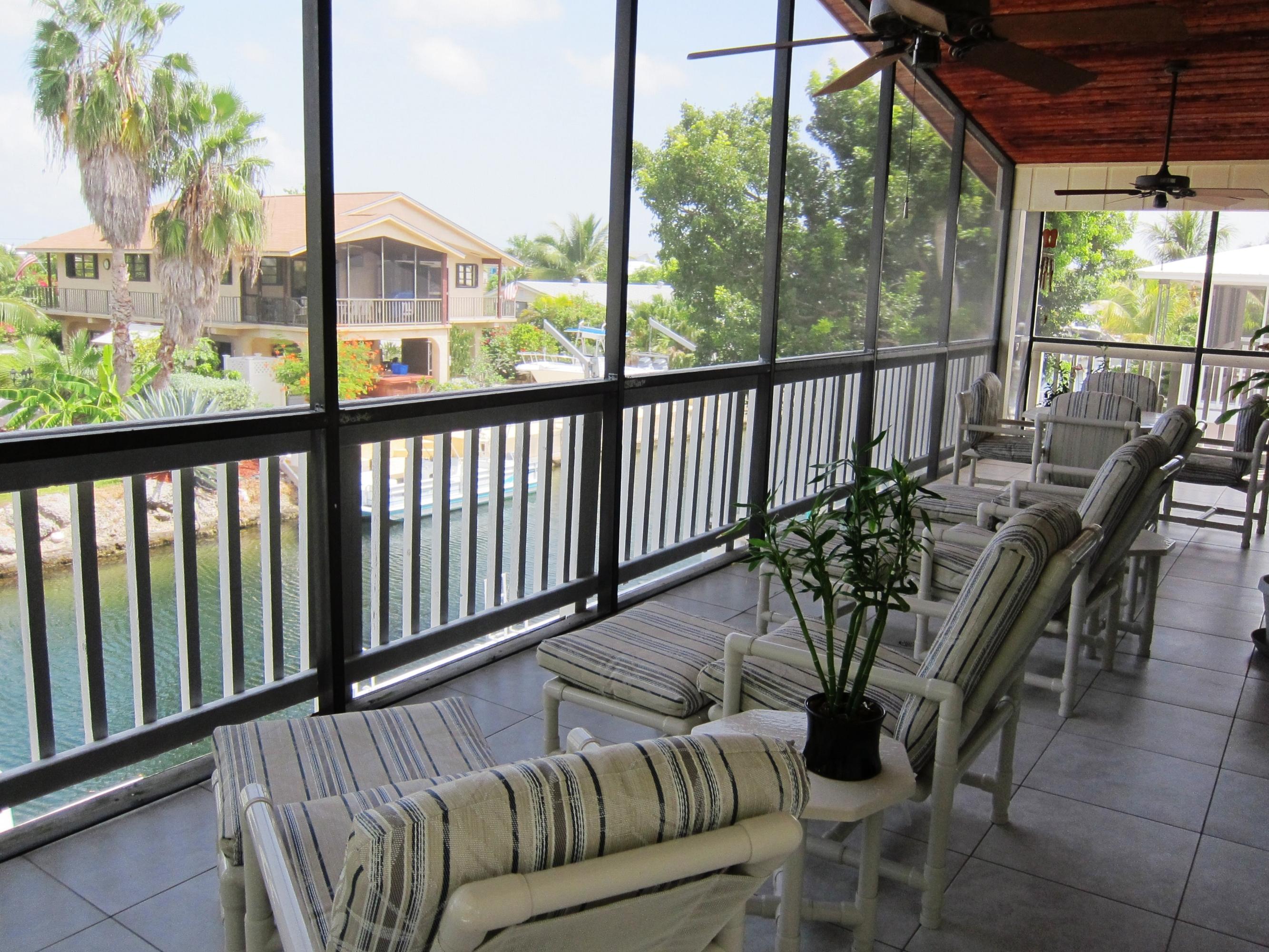 29527 Ranger Avenue Big Pine Key, FL 33043 - Photo 23 of 27 Screened patio off Kitchen & Living Room