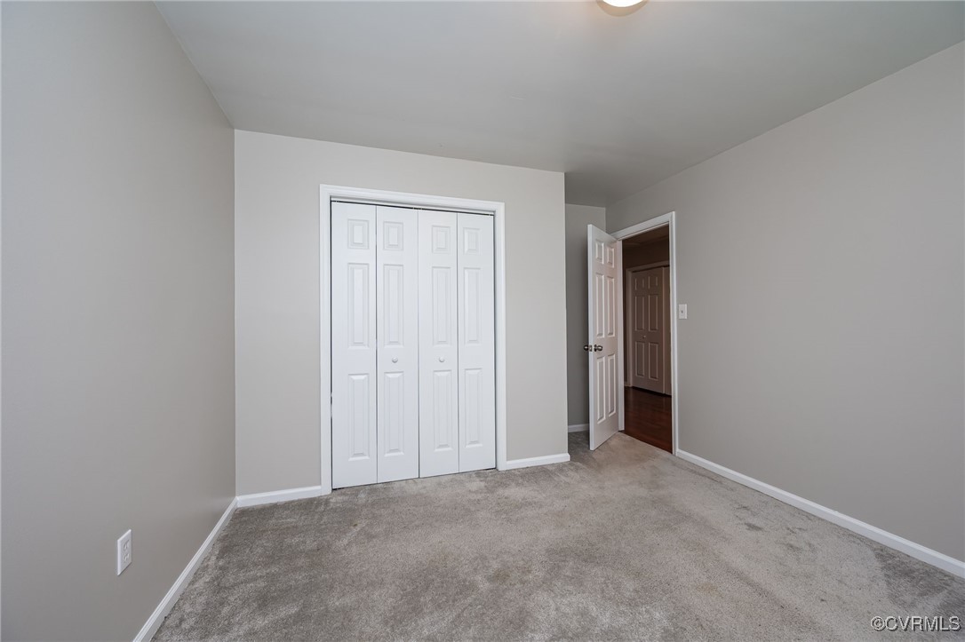 7427 Trailing Rock Road Prince George, VA 23875 - Photo 17 of 25 a view of an empty room and closet area