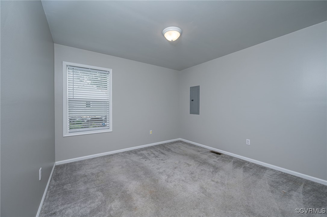 7427 Trailing Rock Road Prince George, VA 23875 - Photo 18 of 25 a view of an empty room with a window