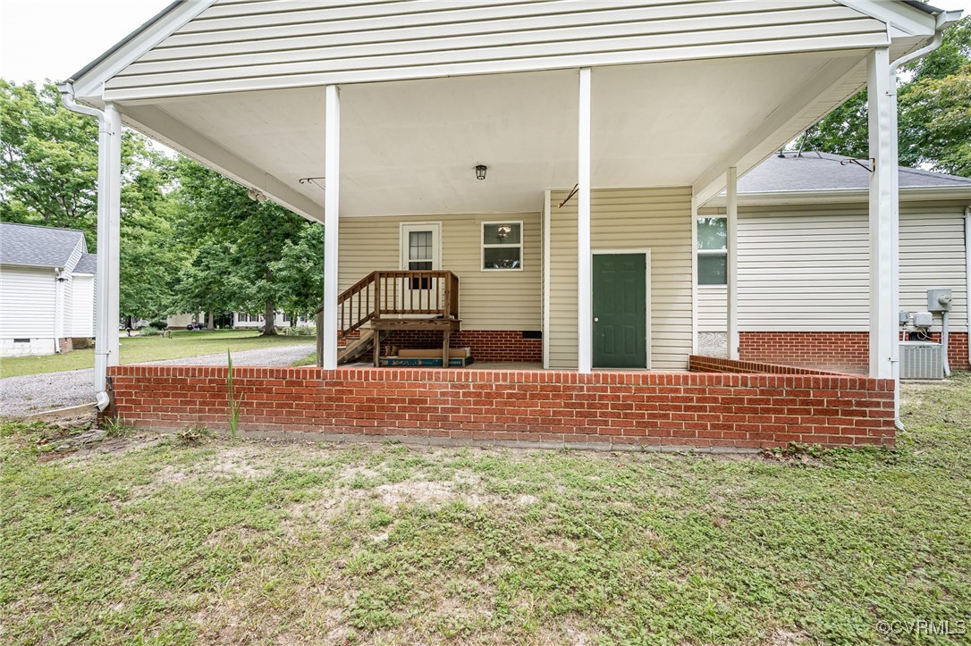 7427 Trailing Rock Road Prince George, VA 23875 - Photo 22 of 25 a view of house with backyard
