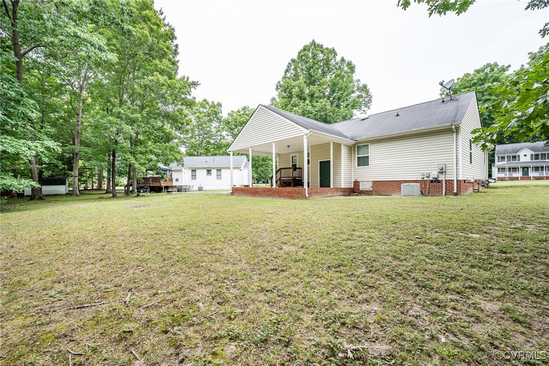 7427 Trailing Rock Road Prince George, VA 23875 - Photo 25 of 25 a front view of a house with yard