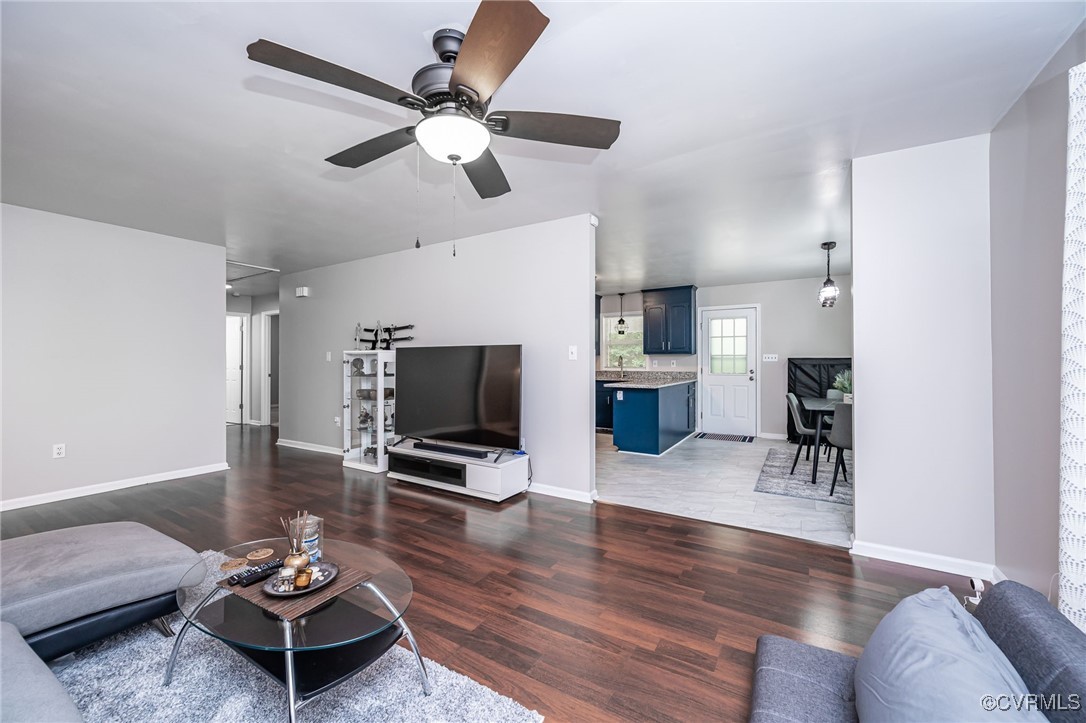 7427 Trailing Rock Road Prince George, VA 23875 - Photo 7 of 25 a living room with furniture and a flat screen tv