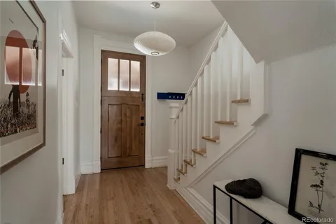 a view of entryway with wooden floor