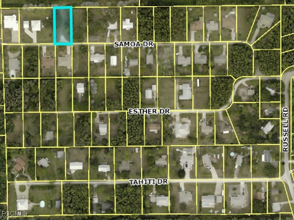 5960 Samoa Drive Bokeelia, FL 33922 - Photo 5 of 5 a view of a gate with a window