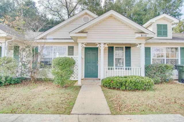 front view of a house and a yard