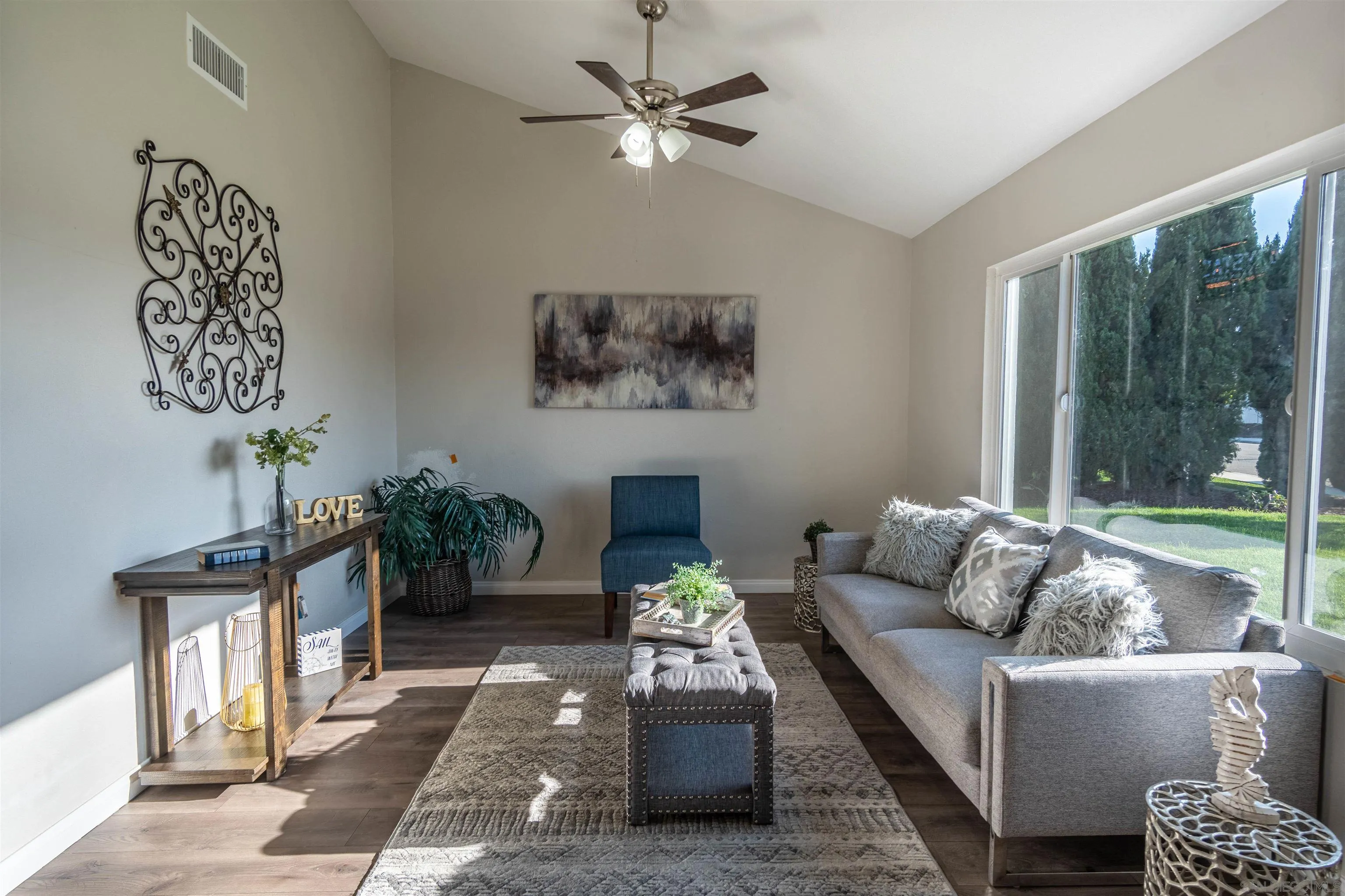 802 El Caminito Road Fallbrook, CA 92028 - Photo 9 of 26 a living room with furniture and a large window
