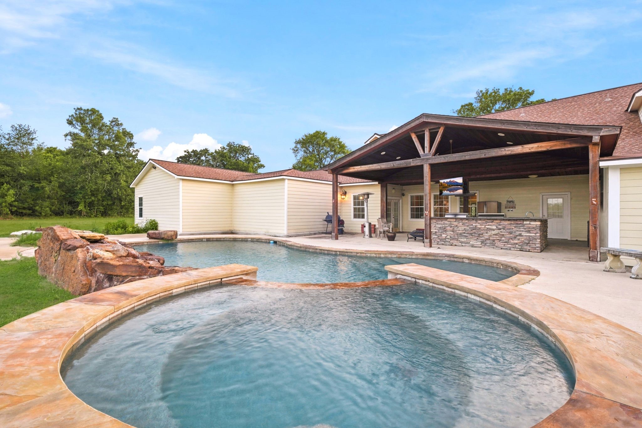 144 Wood Farm Road Huntsville, TX 77320 - Photo 38 of 50 a view of a house with pool and chairs