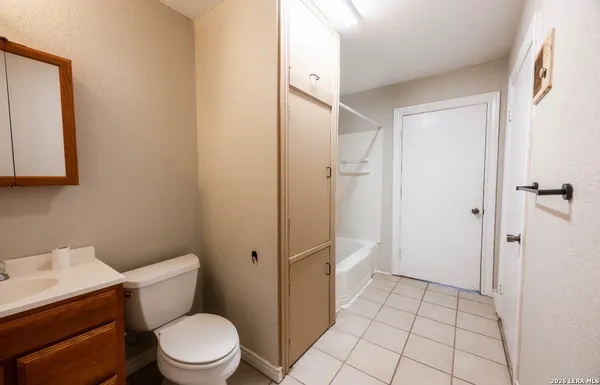 a bathroom with a toilet