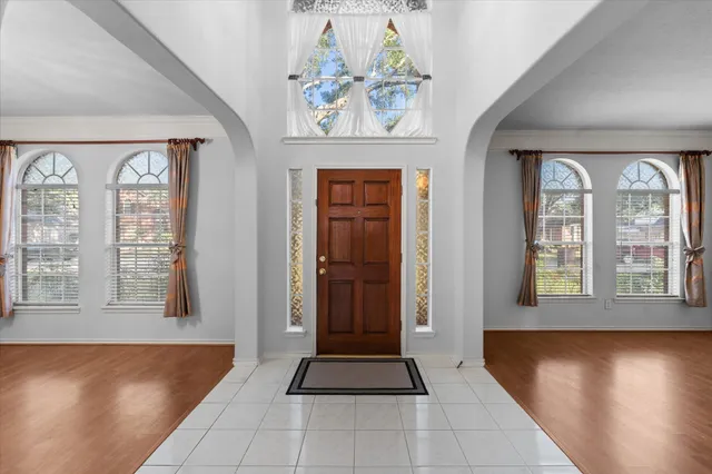 a view of an entryway with a chandelier