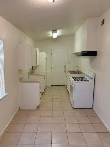 an empty room with a workbench