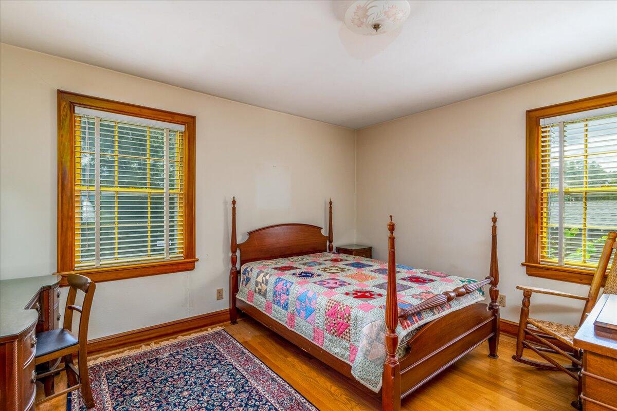 2510 Tillett Road Southwest Roanoke, VA 24015 - Photo 12 of 27 a bedroom with a bed and a window