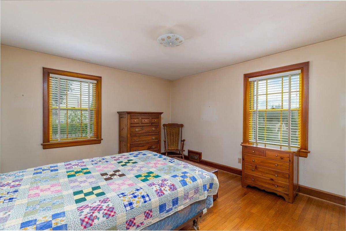 2510 Tillett Road Southwest Roanoke, VA 24015 - Photo 13 of 27 a bedroom with a bed and a window