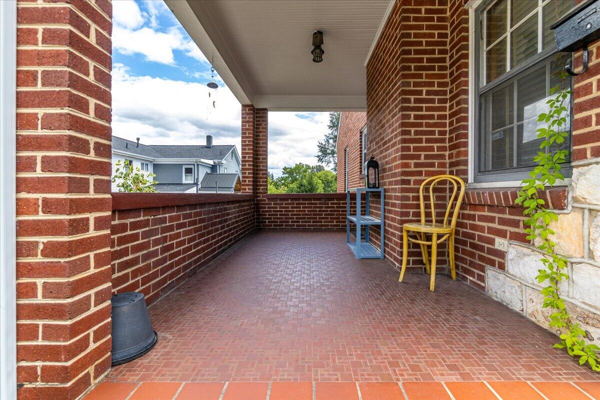 2510 Tillett Road Southwest Roanoke, VA 24015 - Photo 22 of 27 a view of a chairs and table in the balcony