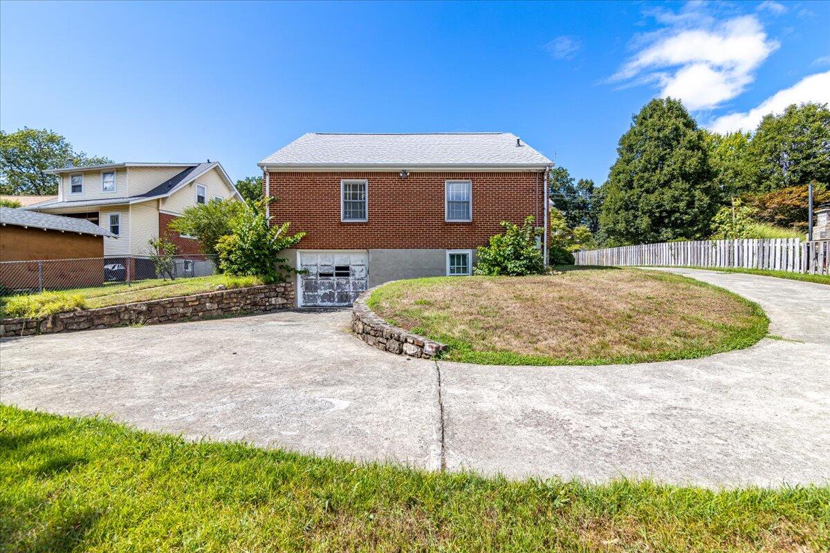 2510 Tillett Road Southwest Roanoke, VA 24015 - Photo 26 of 27 a view of a house with backyard and sitting area