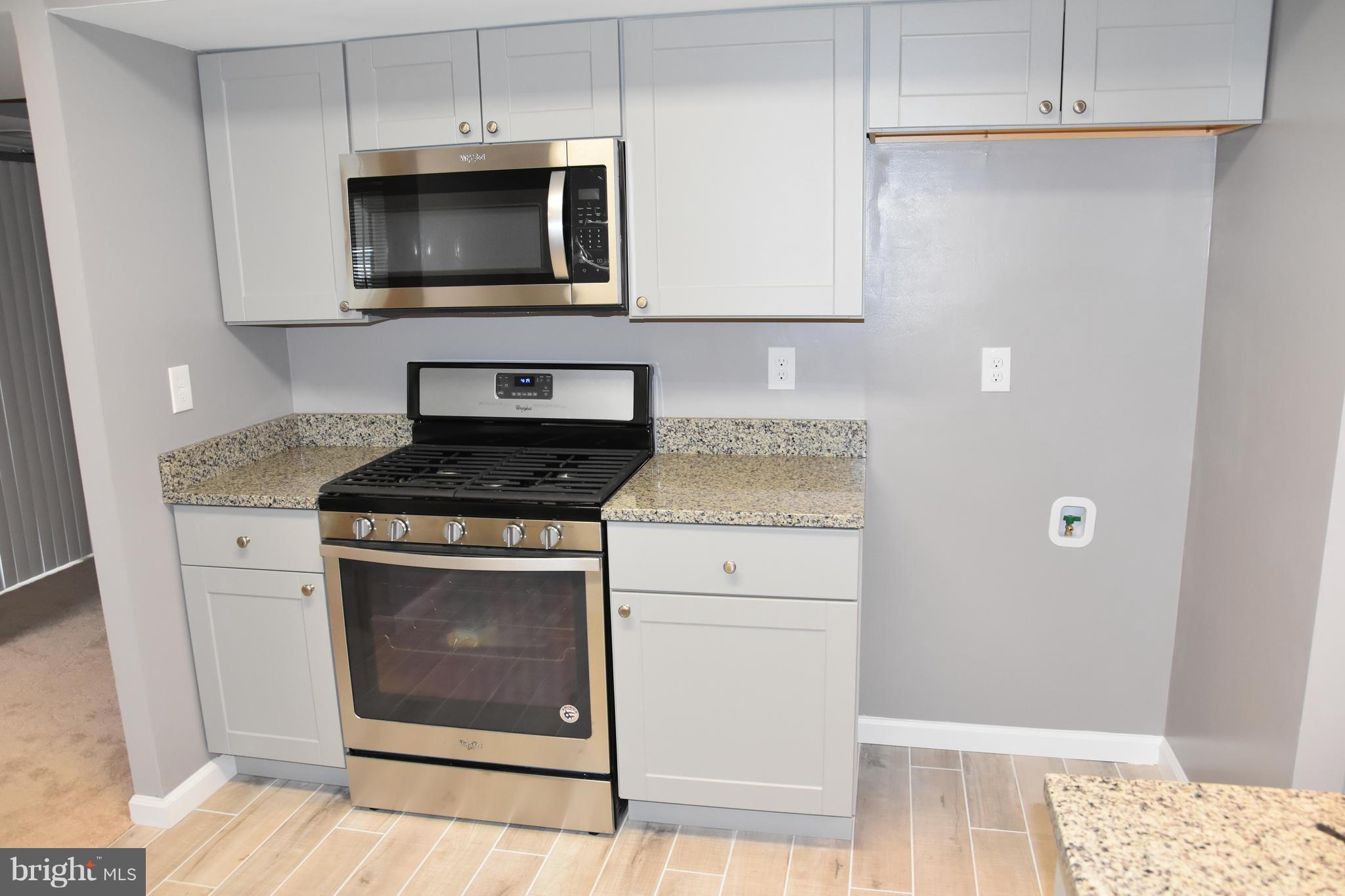 2010 Colts Neck Road, Unit 1B Reston, VA 20191 - Photo 3 of 26 Kitchen - Side By Side Stainless Fridge included