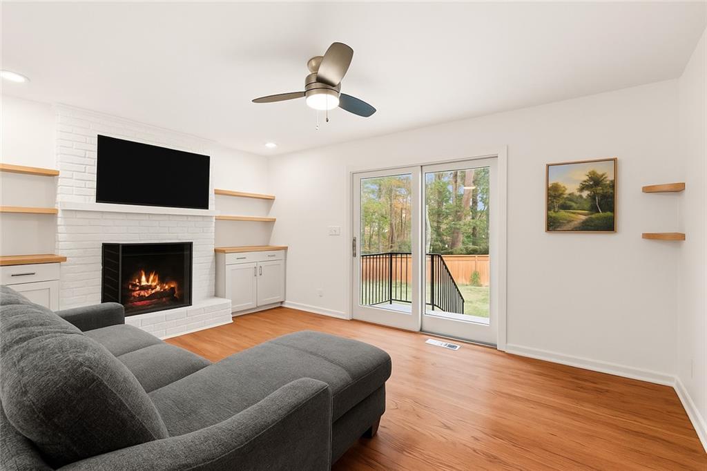 2608 Laurelwood Road Atlanta, GA 30360 - Photo 13 of 45 a living room with furniture and a fireplace