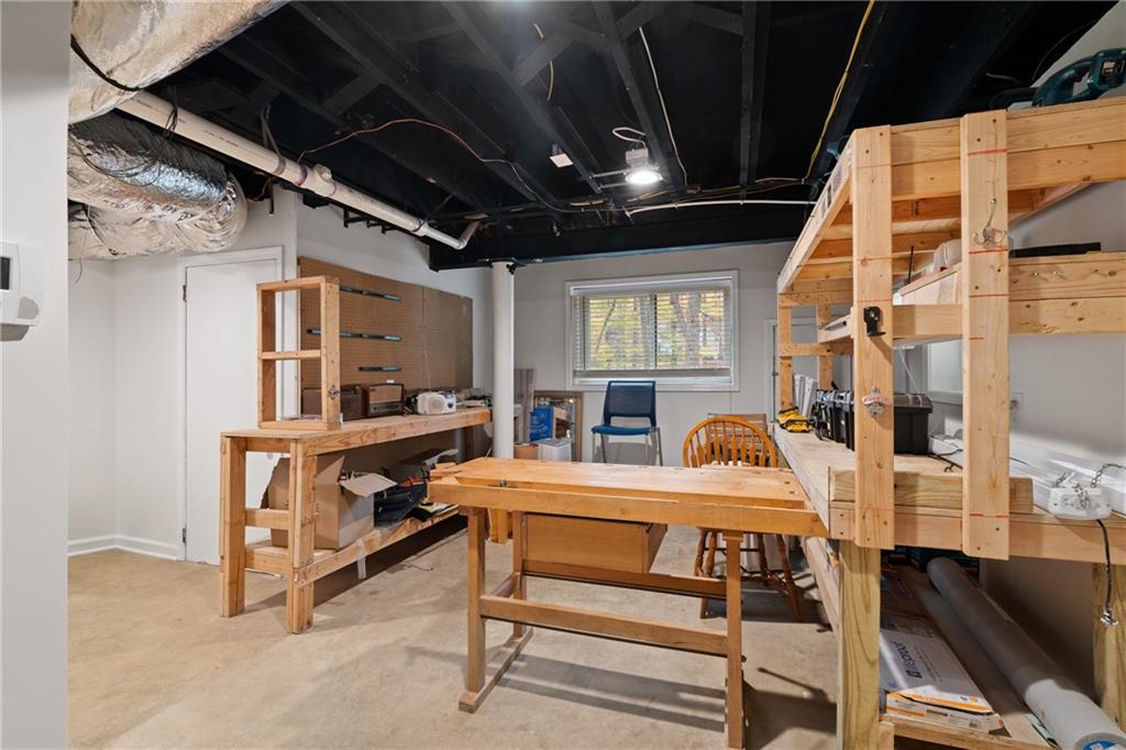 2608 Laurelwood Road Atlanta, GA 30360 - Photo 25 of 45 a bedroom with furniture and a window