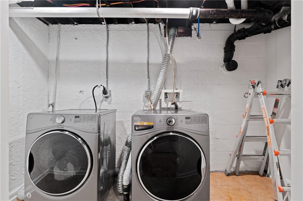 2608 Laurelwood Road Atlanta, GA 30360 - Photo 26 of 45 a utility room with dryer and washer