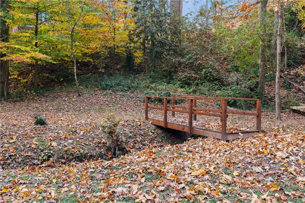 2608 Laurelwood Road Atlanta, GA 30360 - Photo 34 of 45 a view of a wooden house with a yard
