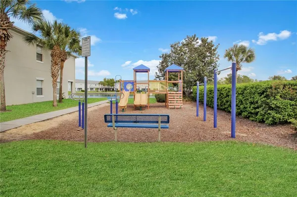 a view of a park with plants and trees