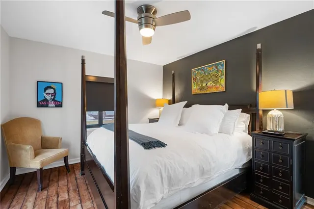 a bathroom with a sink a vanity and a shower