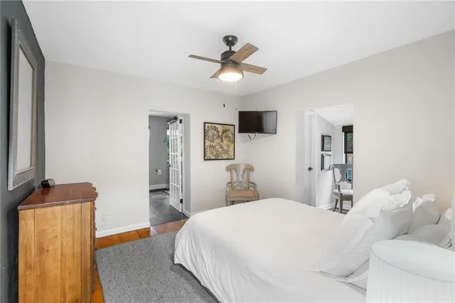 a bathroom with a shower and toilet