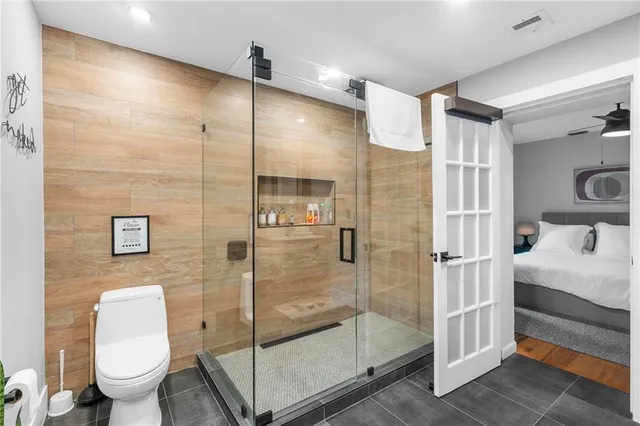 a bedroom with a bed and closet