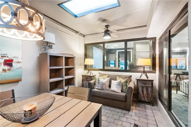 a view of a backyard with sitting area