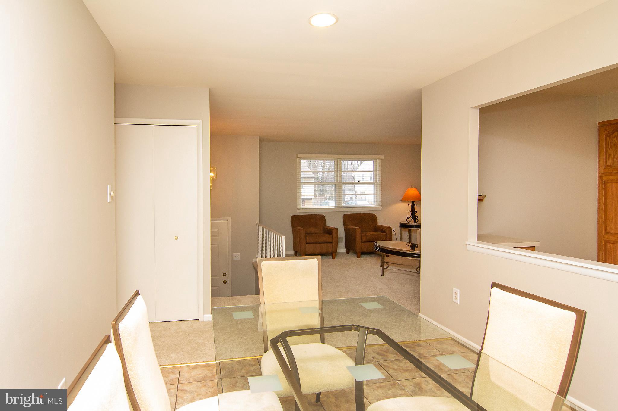 116 Strongwood Road Owings Mills, MD 21117 - Photo 11 of 32 Dining Room Looking Into Living Room