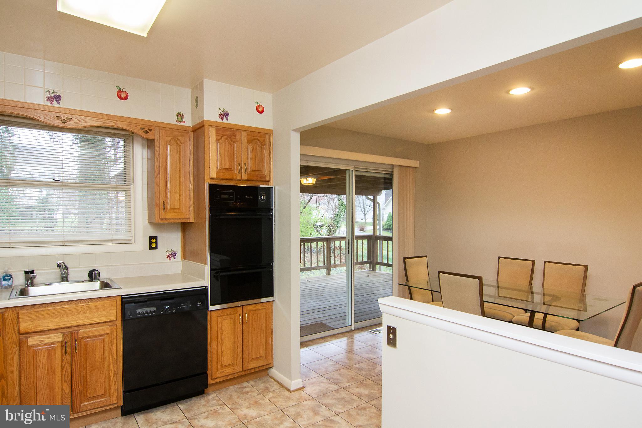 116 Strongwood Road Owings Mills, MD 21117 - Photo 13 of 32 Kitchen Into Dining Room