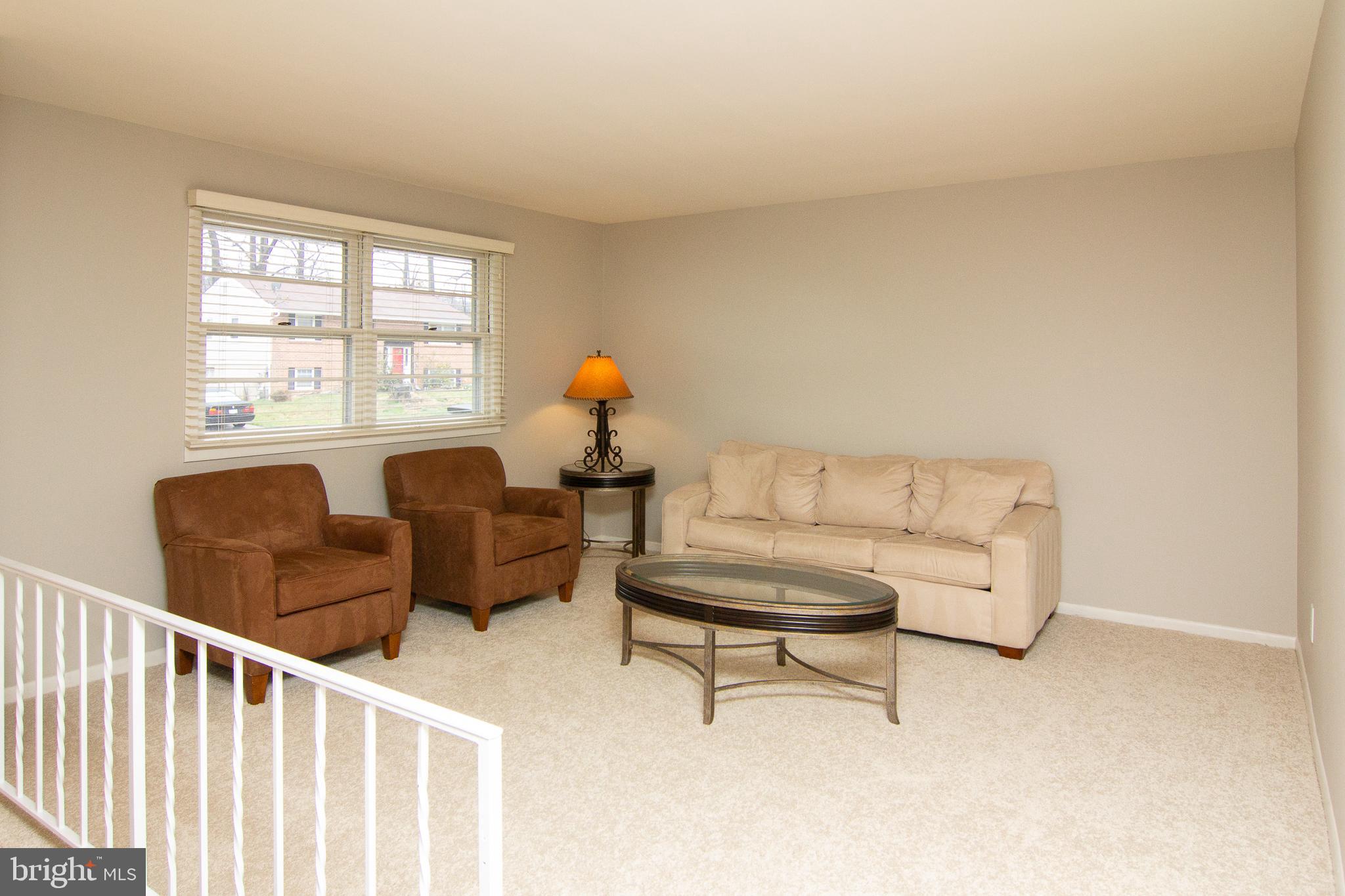 116 Strongwood Road Owings Mills, MD 21117 - Photo 5 of 32 Spacious Living Room With New Carpet