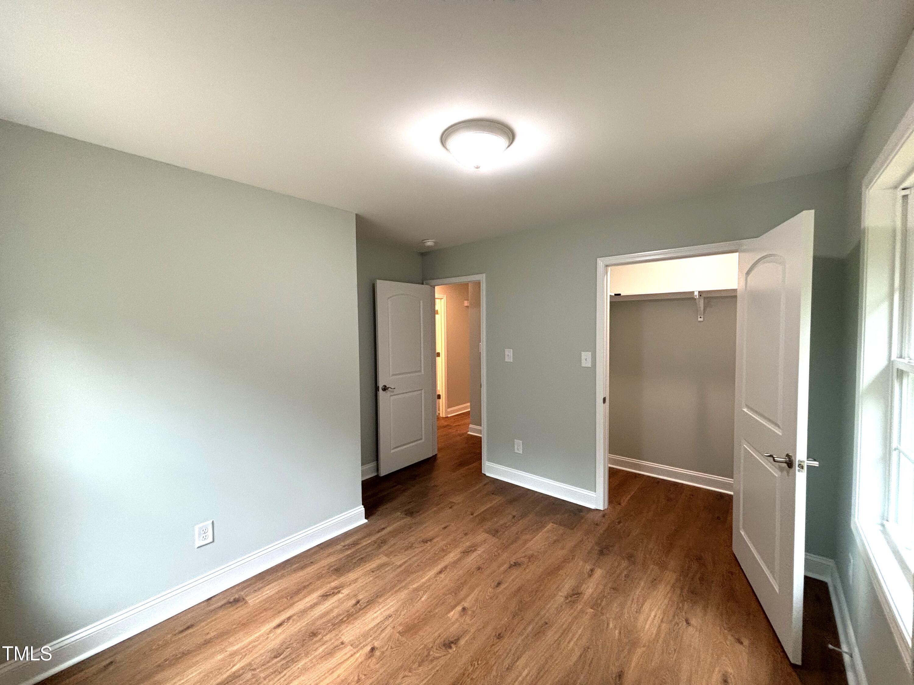 2665 Bodie Currin Road Oxford, NC 27565 - Photo 24 of 26 wooden floor in an empty room