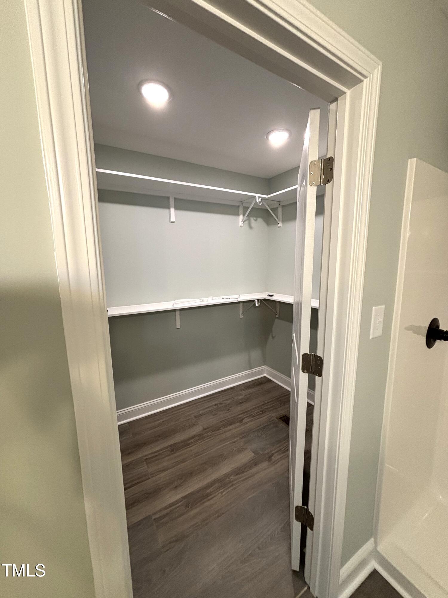 2665 Bodie Currin Road Oxford, NC 27565 - Photo 26 of 26 a view of walk in closet with empty racks