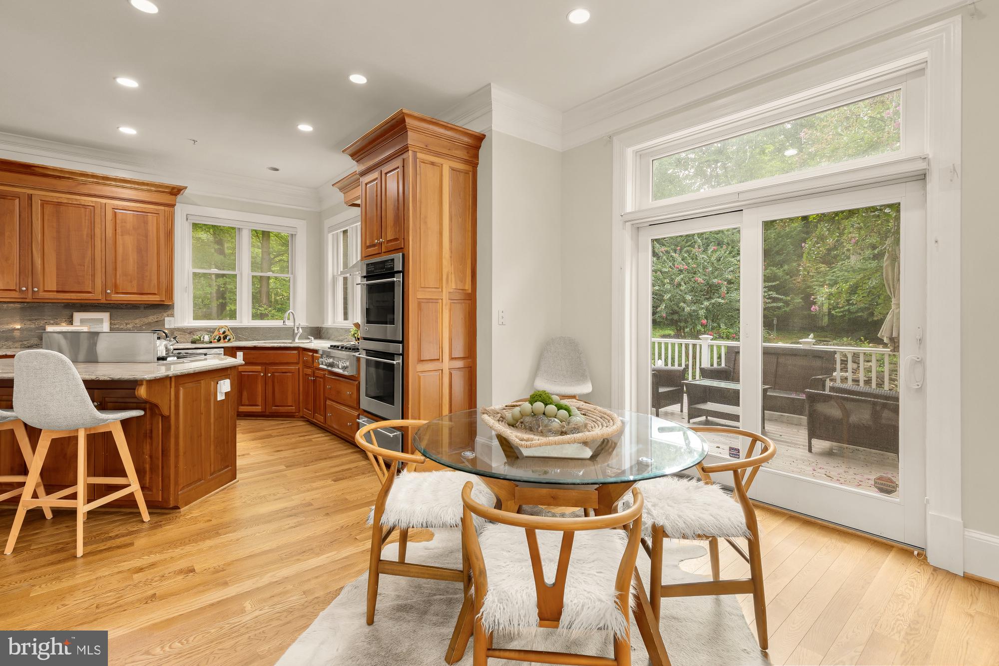 8505 Howell Road Bethesda, MD 20817 - Photo 31 of 75 Eat-in kitchen with sliding door to outdoor deck
