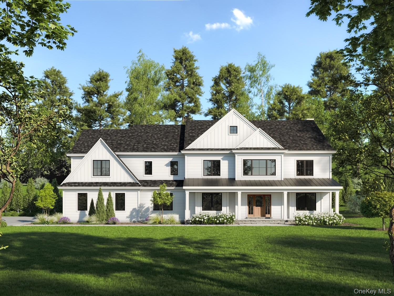 115 Old Roaring Brook Road Mount Kisco, NY 10549 - Photo 1 of 25 a front view of a house with a garden