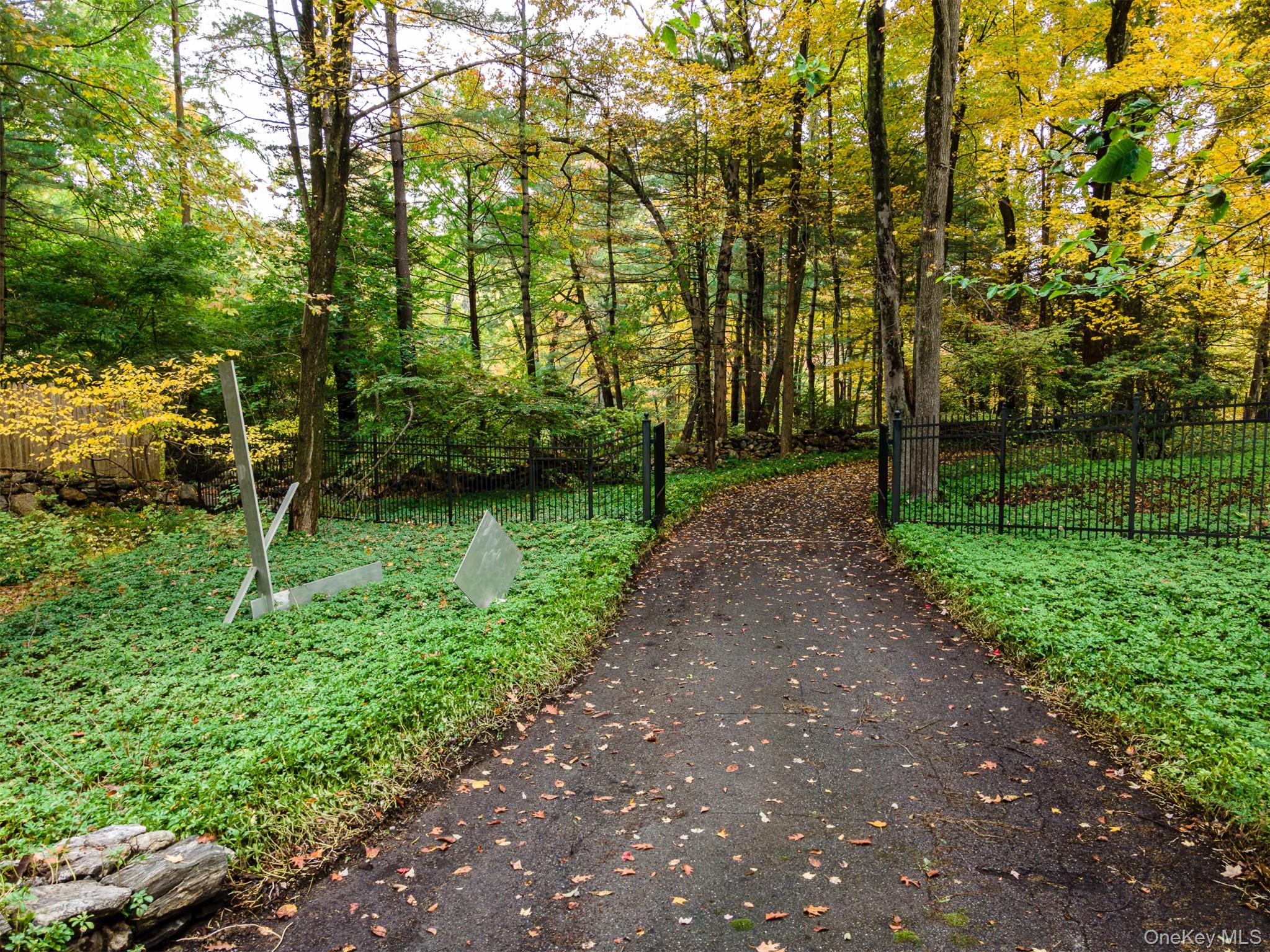 115 Old Roaring Brook Road Mount Kisco, NY 10549 - Photo 12 of 20 a view of backyard with green space