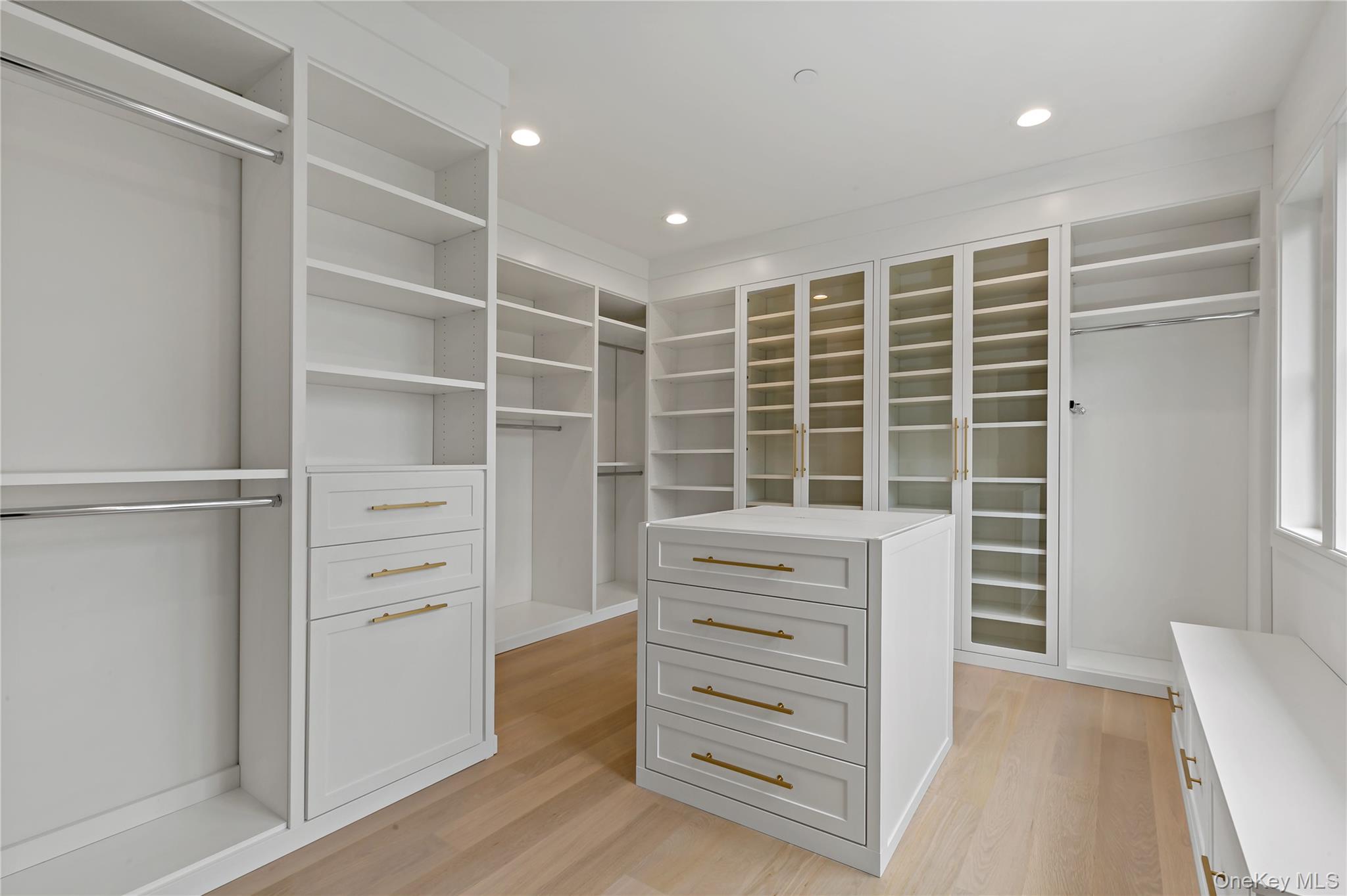 115 Old Roaring Brook Road Mount Kisco, NY 10549 - Photo 14 of 25 a view of walk in closet with empty racks