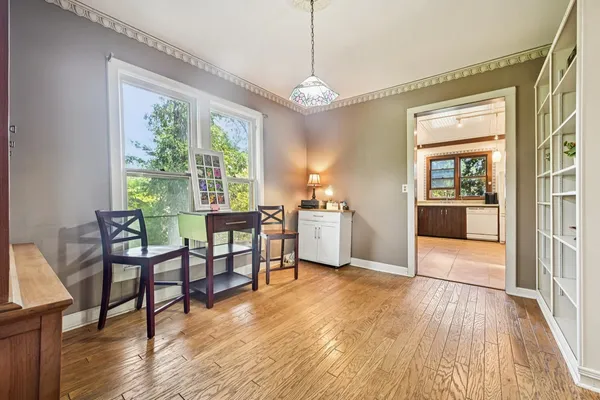 a kitchen with a stove a sink and a refrigerator