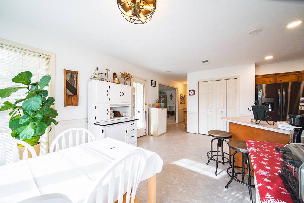 4856 Spring Ridge Drive Columbus, GA 31909 - Photo 16 of 41 a bedroom with furniture and a flat screen tv