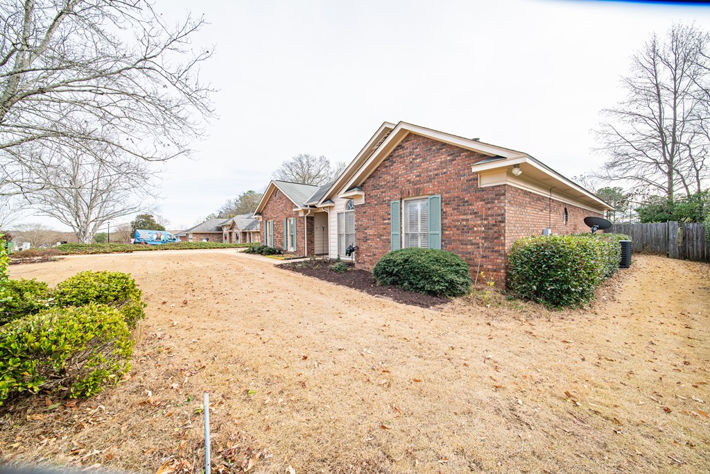 4856 Spring Ridge Drive Columbus, GA 31909 - Photo 2 of 41 a view of a house with a yard