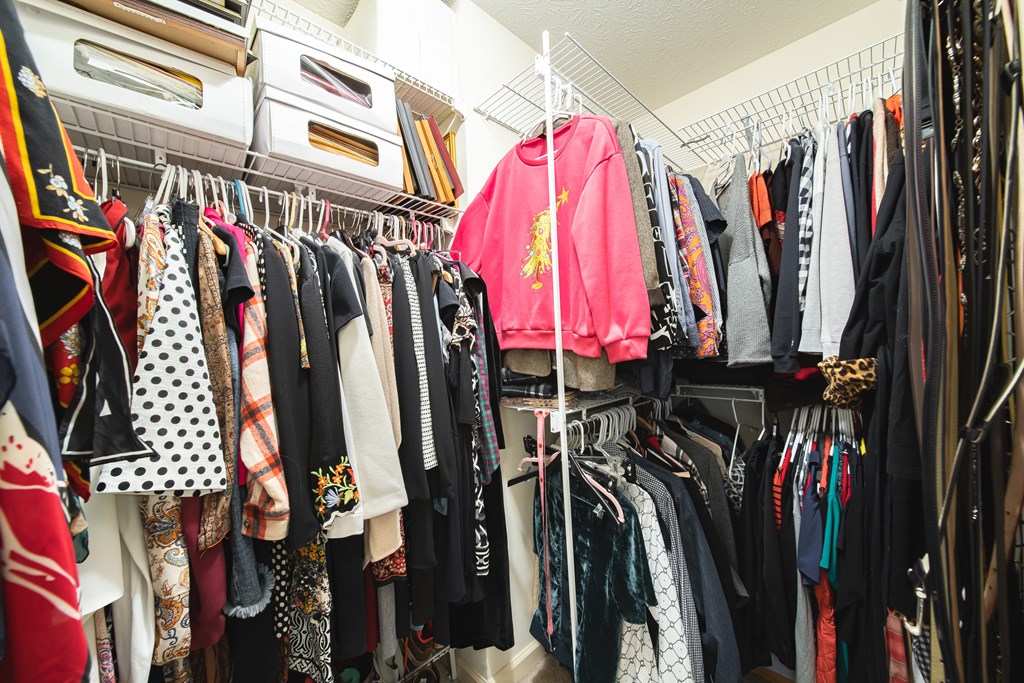 4856 Spring Ridge Drive Columbus, GA 31909 - Photo 26 of 41 a view of walk in closet with clothes