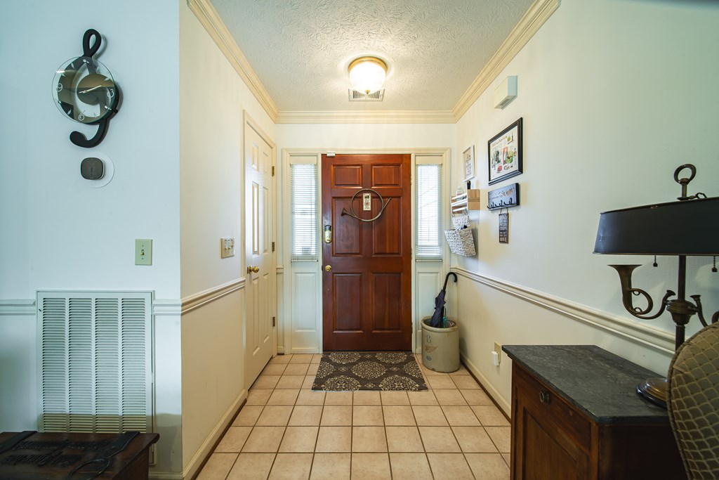 4856 Spring Ridge Drive Columbus, GA 31909 - Photo 6 of 41 a bathroom with a shower and mirror