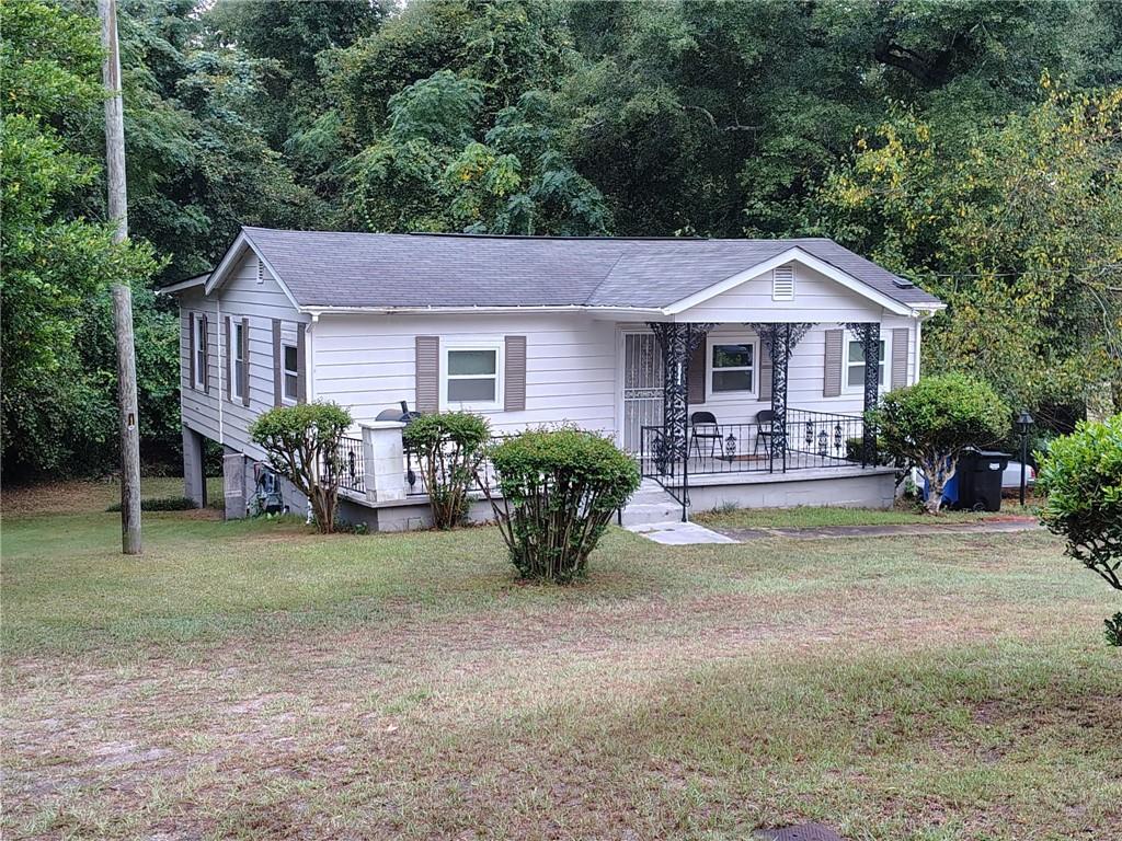 5644 Peggy Drive Columbus, GA 31907 - Photo 2 of 3 a view of a house with backyard