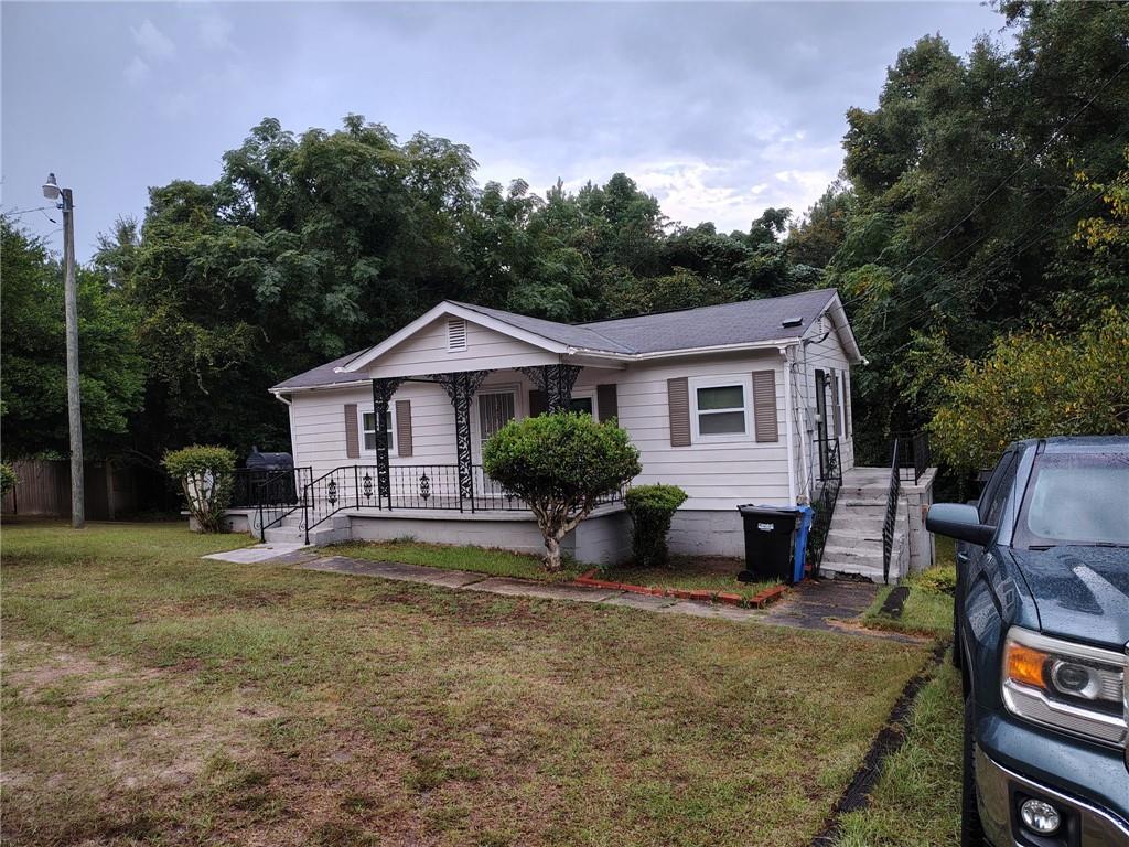 5644 Peggy Drive Columbus, GA 31907 - Photo 3 of 3 a front view of a house with garden