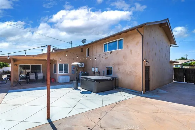 a view of a house with a patio