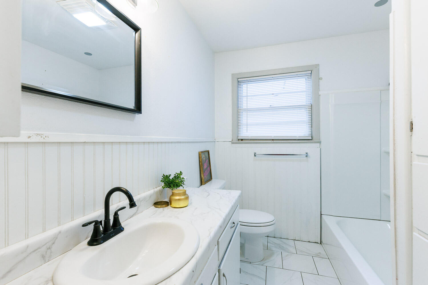 2116 36th Street Lubbock, TX 79412 - Photo 22 of 34 Hall Bathroom