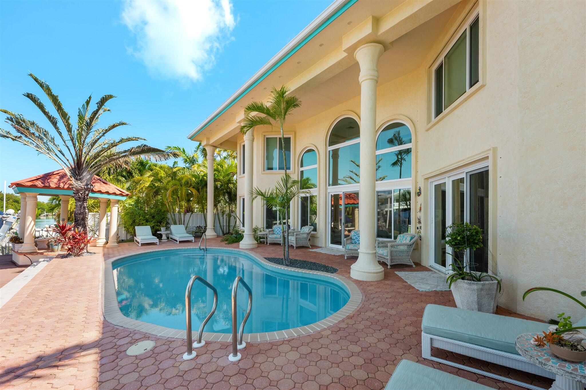 431 12th Street Key Colony Beach, FL 33051 - Photo 5 of 31 Pool Patio Rear Entrance
